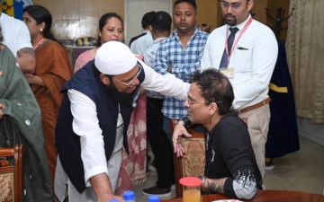 chancellor of ustm shri mahbubul hoque with zubeen garg